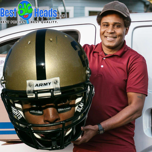 Proud father holding his son’s giant Best BIG Heads™ cutout during a special game to show support.