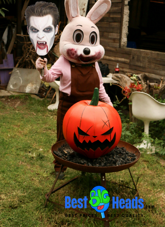 A man dressed in a creepy rabbit costume, complete with eerie eyes and tattered fur, holding a face cutout of Count Dracula with sharp fangs and a sinister grin.