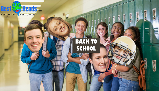 Group of friends holding a life-size face cutout of their friend, smiling and laughing as they prepare for a fun prank.