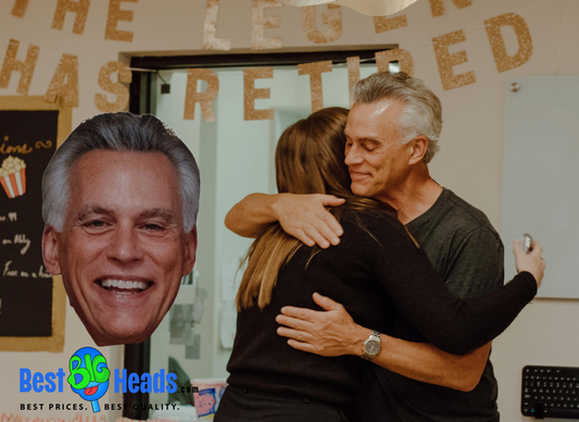 A cheerful photo taken during a retirement party. Everyone is smiling and enjoying the moment, reflecting camaraderie and gratitude for years of shared work and friendship, captured in a lively and heartfelt celebration.