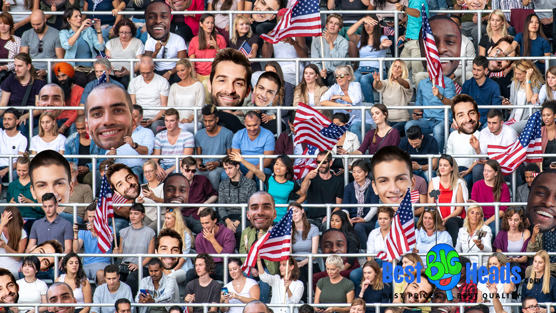 A crowd of people sitting in a stadium, many holding American flags, with several oversized cutout heads superimposed over some of their faces.