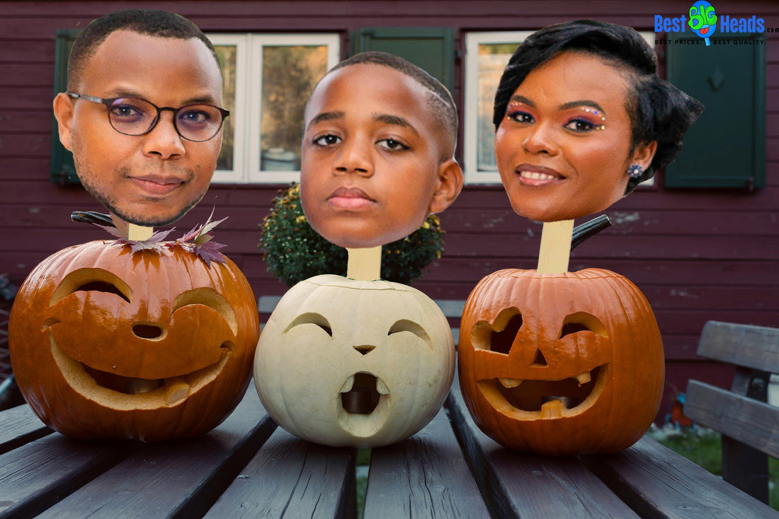A festive Halloween display featuring oversized face cutouts of each family member, arranged as fun and spooky decorations on the front lawn.