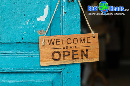 Storefront entrance with promotional signage designed to attract and welcome customers