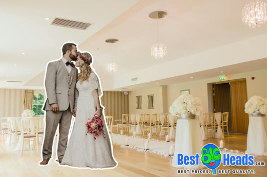 Life-size stand-up of the newlyweds displayed at their wedding reception entrance, welcoming guests with a fun and personal touch.