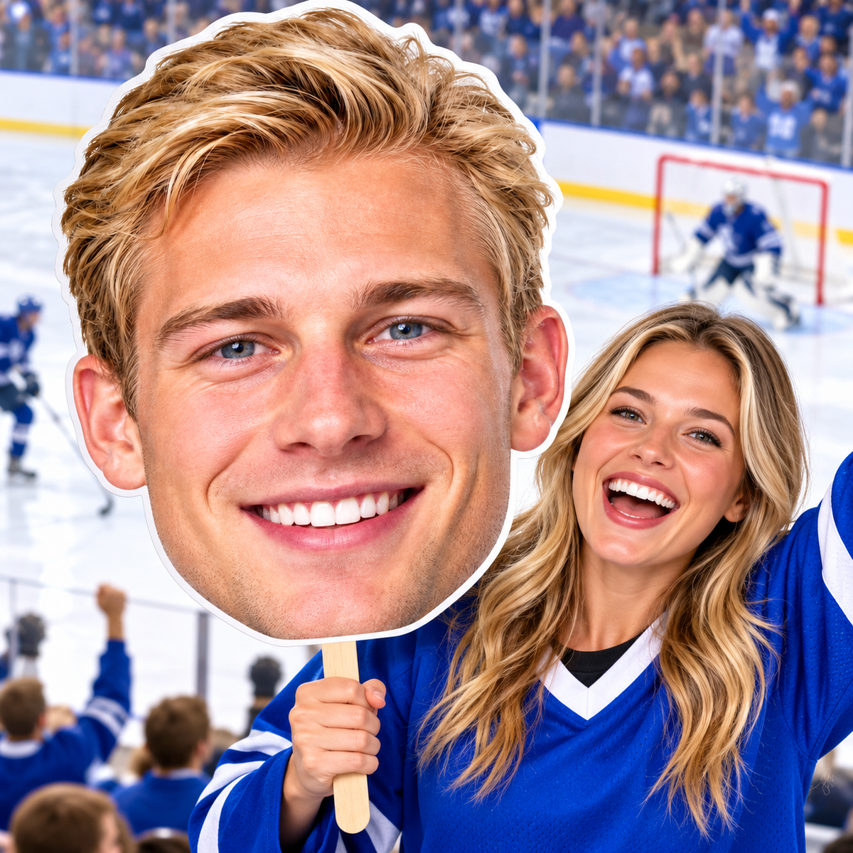Hockey fan holding an oversized player face cutout beside the ice rink