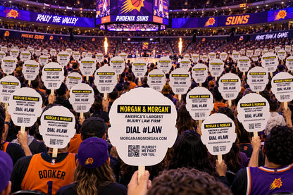 Illustration of an arena crowd holding cutouts with sponsor advertising on the backs.