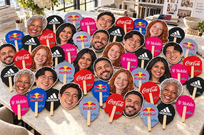 Illustration of face cutouts and colorful sponsor-printed backs on a tabletop.
