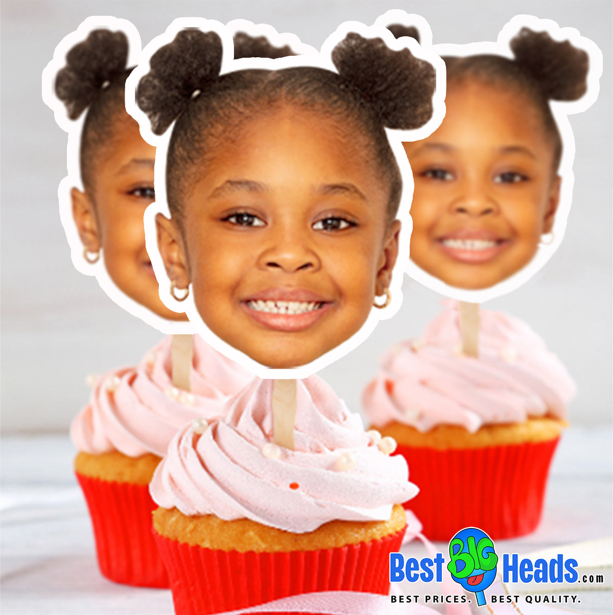 Personalized photo cupcake toppers displayed on cupcakes at a party.