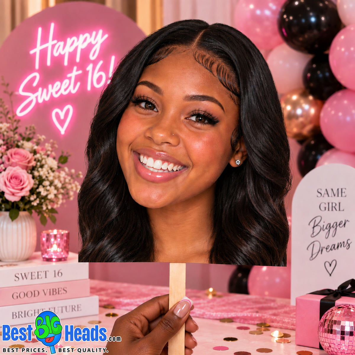 A smiling woman with long black wavy hair is shown in a decorated party setting with pink and black balloons, a neon sign reading 'Happy Sweet 16!', and a sign that says 'Same Girl Bigger Dreams'. A hand holds a wooden sign in front of her.